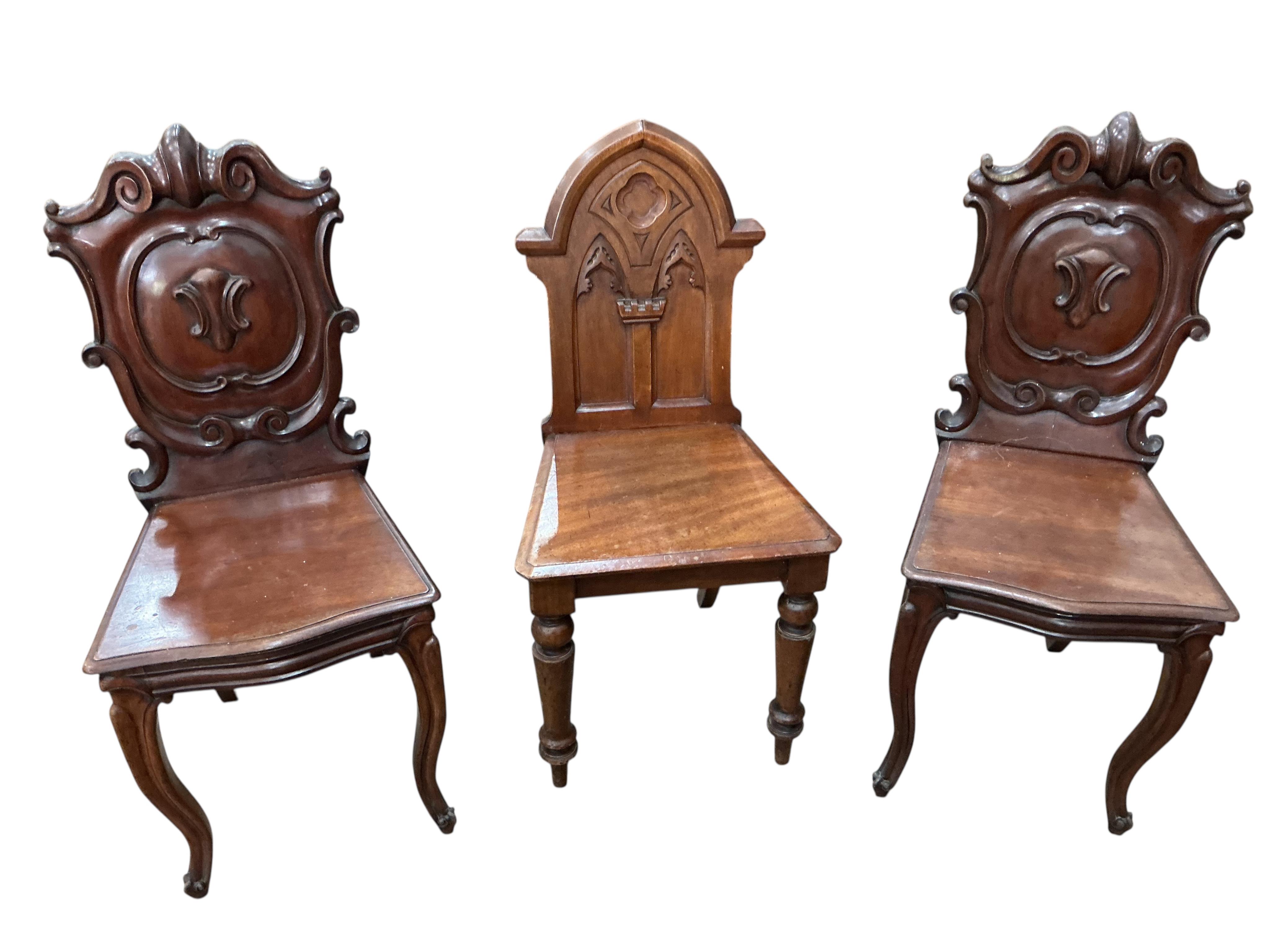 Three (two plus one) Victorian mahogany hall chairs